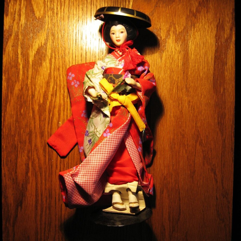 Female Japanesse Doll 9.25 inches tall with stand